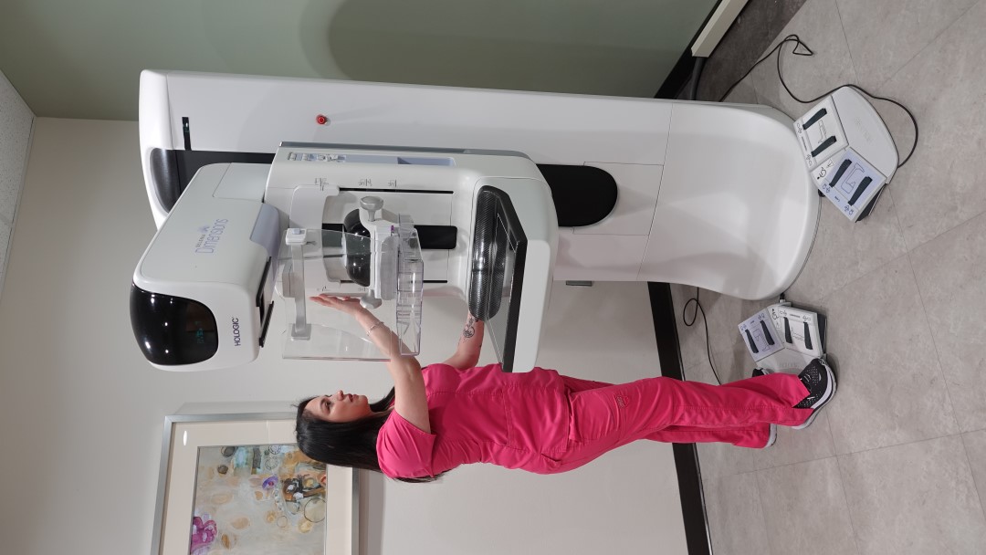 File Photo Of Employee With Mammogram Unit